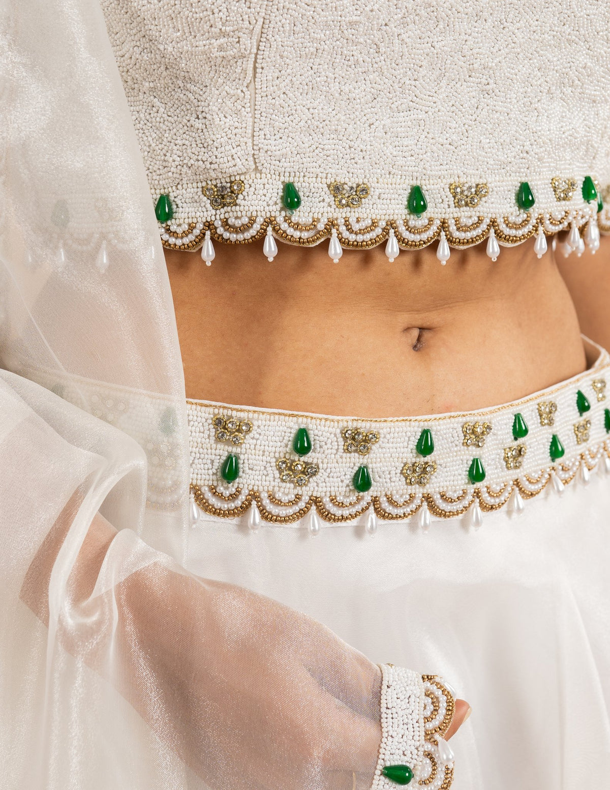 Ivory lehenga with pearl and emerald cape blouse – Organza silk
